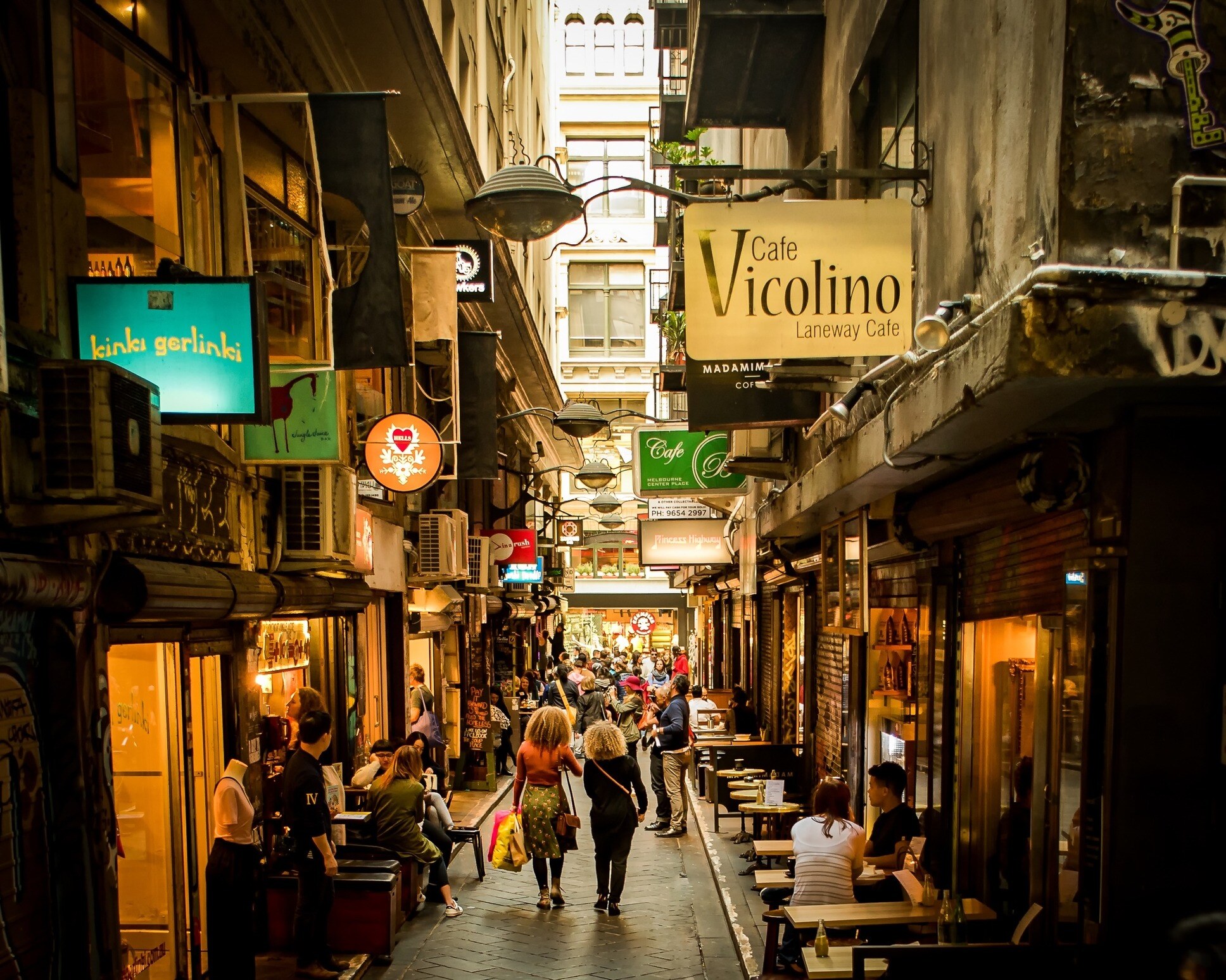 Lively commercial laneway with cafés and independent businesses